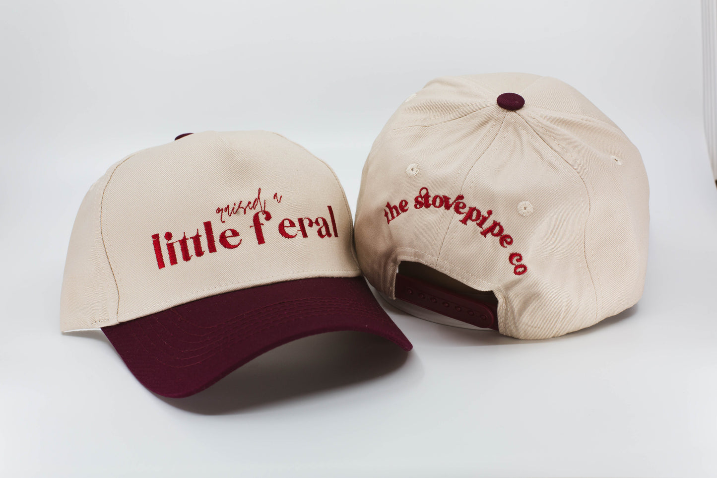 Raised A Little Feral Trucker Hat