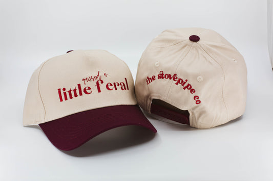 Raised A Little Feral Trucker Hat